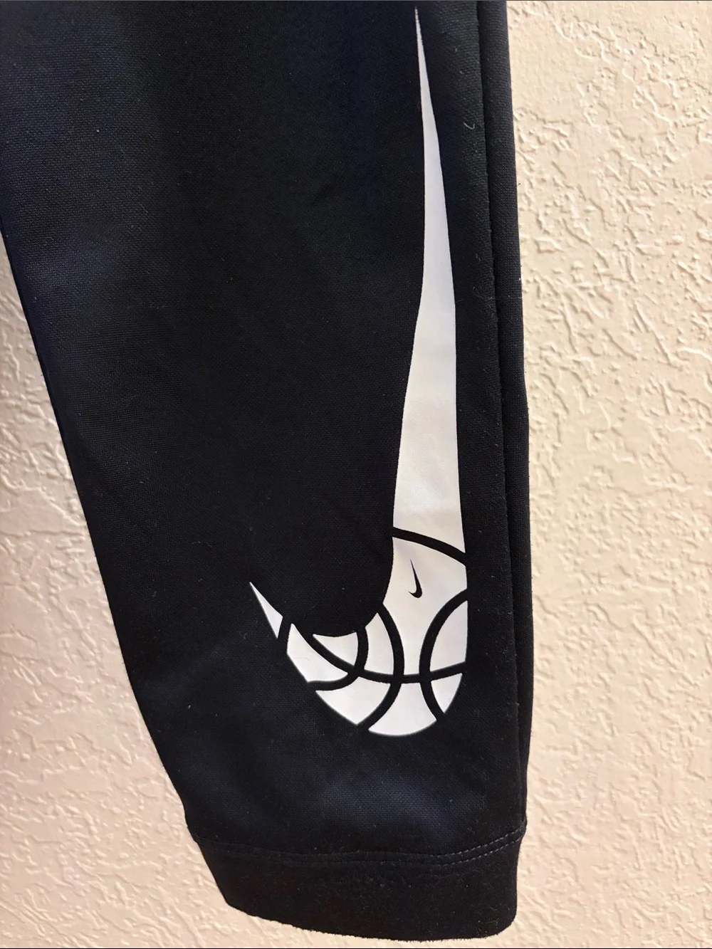 Nike Kids Black Joggers with White Swoosh